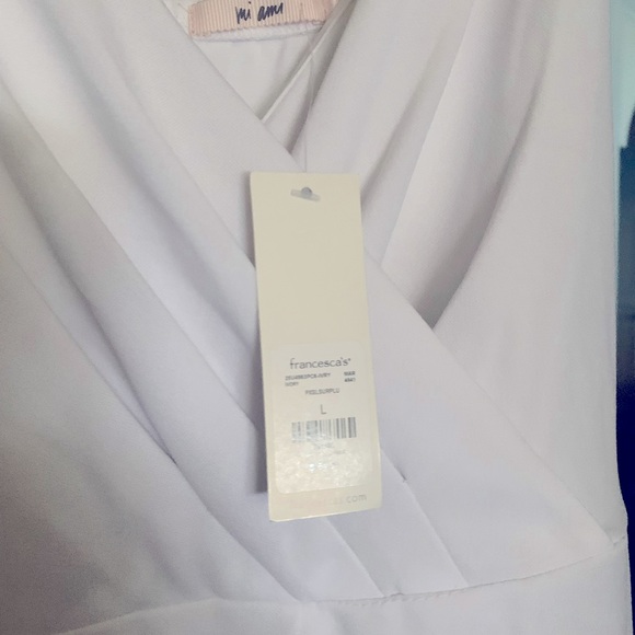 Francesca’s White jumpsuit - Picture 2 of 3